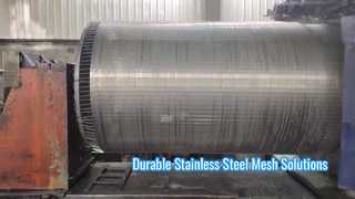Machines and workers in the workshop are producing and processing wedge-wire screens.